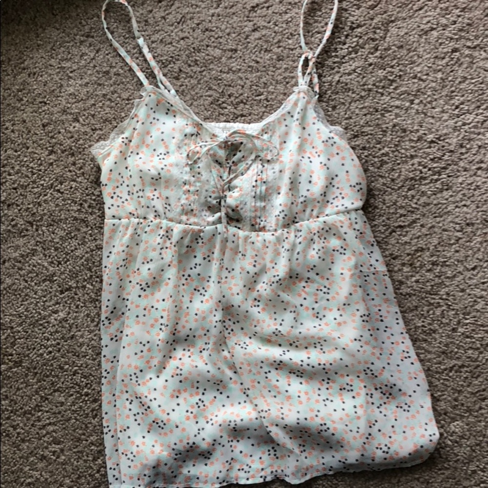 Floral flowing tank